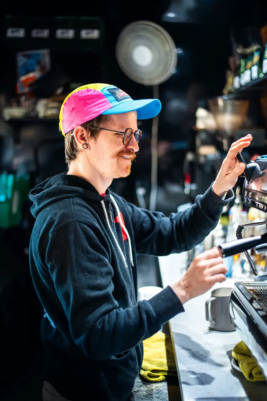Smiling barista at Spaddy’s Coffee Co. in Tampa